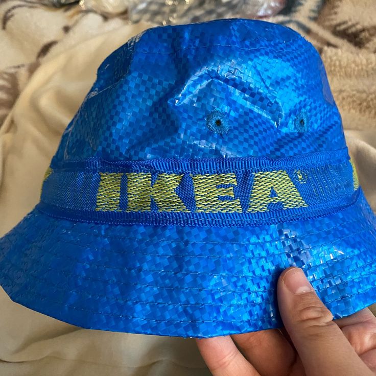 This Is A Bucket Hat Made Out Of An Ikea Bag Haha Blue Casual Bucket Hat For Travel, Casual Blue Bucket Hat For Travel, Blue Bucket Hat One Size For Summer, Trendy Blue Travel Hat, Blue Bucket Hat For Vacation, Fun Blue Bucket Hat, Blue Bucket Hat For Travel, Fun Blue Brimmed Bucket Hat, Blue Bucket Hat One Size Fits Most