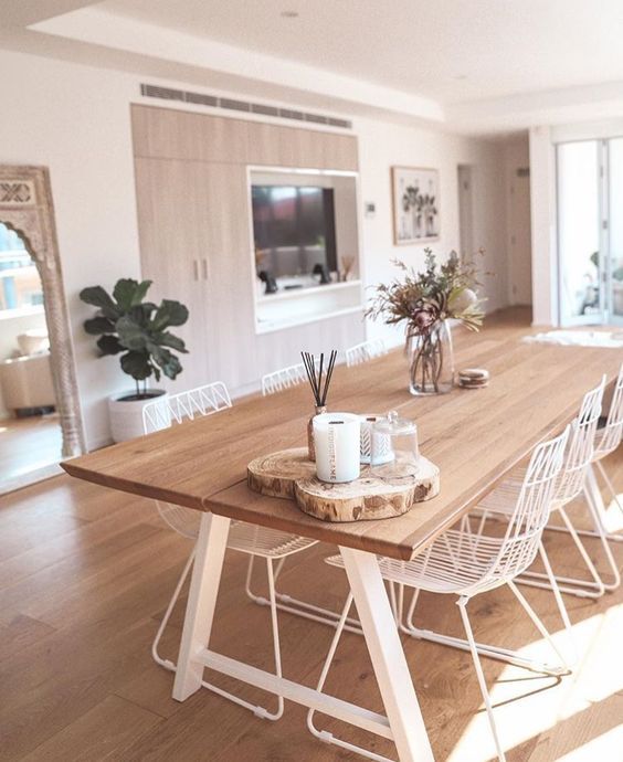 an instagram photo of a dining room table with chairs and coffee mugs on it