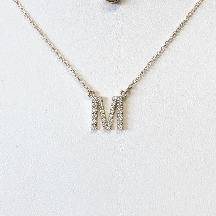 These delicate letters or initial pendants are covered in bright sparkling diamonds. The initial pendant is a very popular gift in our brick and mortar store and comes in yellow, white, and rose 14k gold as well as all the letters of the alphabet! They also make a great layering necklace. Metal: 14K Gold Length: 16 Inches Diamonds: Vary with Letter - Approximately 1/5 CTW, SI2 G SKU:NIL10 **These necklaces are made to order, please allow up to two weeks to complete your order. If you need a rush Silver Initial Pendant Diamond Necklace In 14k Gold, Silver 14k Gold Initial Pendant Diamond Necklace, 14k Gold Silver Diamond Initial Pendant Necklace, Silver Diamond Initial Pendant Necklace In 14k Gold, Brick And Mortar, Layering Necklace, Initial Pendant, The Alphabet, Sparkle Diamonds