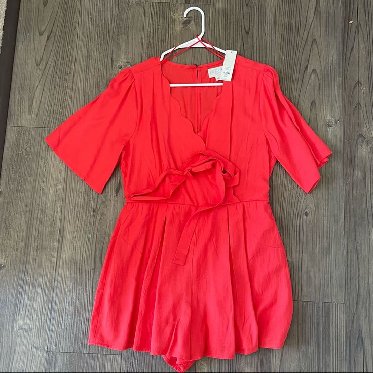 New With Tags Red Romper With Scalloped Detail, Tie For Waist Red Jumpsuits And Rompers For Summer Workwear, Casual Red V-neck Jumpsuits And Rompers, Casual Red V-neck Jumpsuit, Chic Red Short Sleeve Jumpsuits And Rompers, Red V-neck Jumpsuits And Rompers For Spring, Red V-neck Jumpsuit For Spring, Red Jumpsuits And Rompers For Day Out, Red Fitted Jumpsuits For Day Out, Light Blue Romper