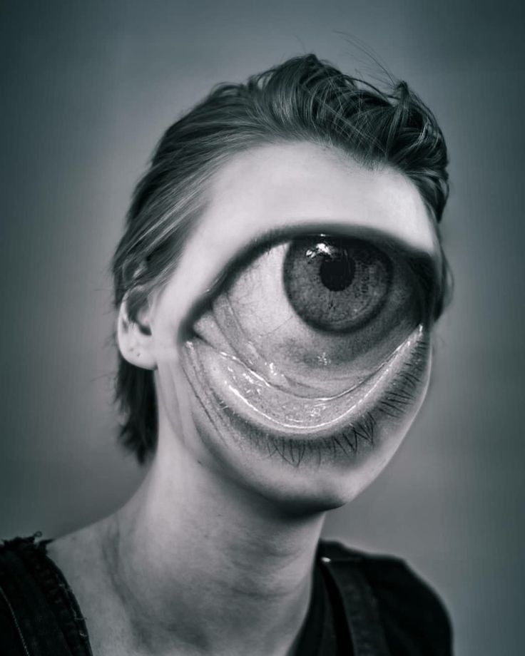 a woman's face with an eyeball in the shape of a human head