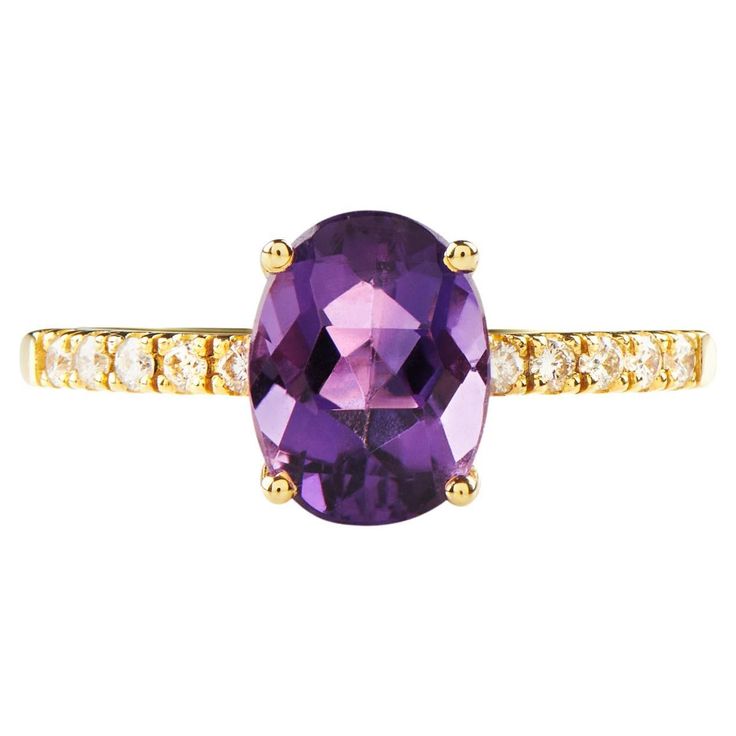 Eliania Rosetti's studio in São Paulo/Brazil designed this elegant solitaire and engagement ring in 3D programming. Its main stone is an oval shaped amethyst measuring 9 x 7mm and 5 diamonds measuring 1.5mm on each side of this stone, totaling 10 diamonds weighing 0.16 carats. The height of the main stone lends elegance to the piece, while the diamonds add value and shine to the set. This ring was produced in Europe/Portugal in 18k GOLD (carats) also known as 750 gold, hallmarked by the Mint and identified with the hallmark of MISSIAN JEWELERY, guaranteeing the use of the noble material described above and whose company is standardized. Amethyst is the birthstone for February, one of the most sought after crystals today and well known for its striking purple color. It's a variety of quartz Sao Paulo Brazil, Jewelry Rings Engagement, Ring Verlobung, Purple Color, In The Heights, Violet, 18k Gold, Jewelry Rings, Amethyst