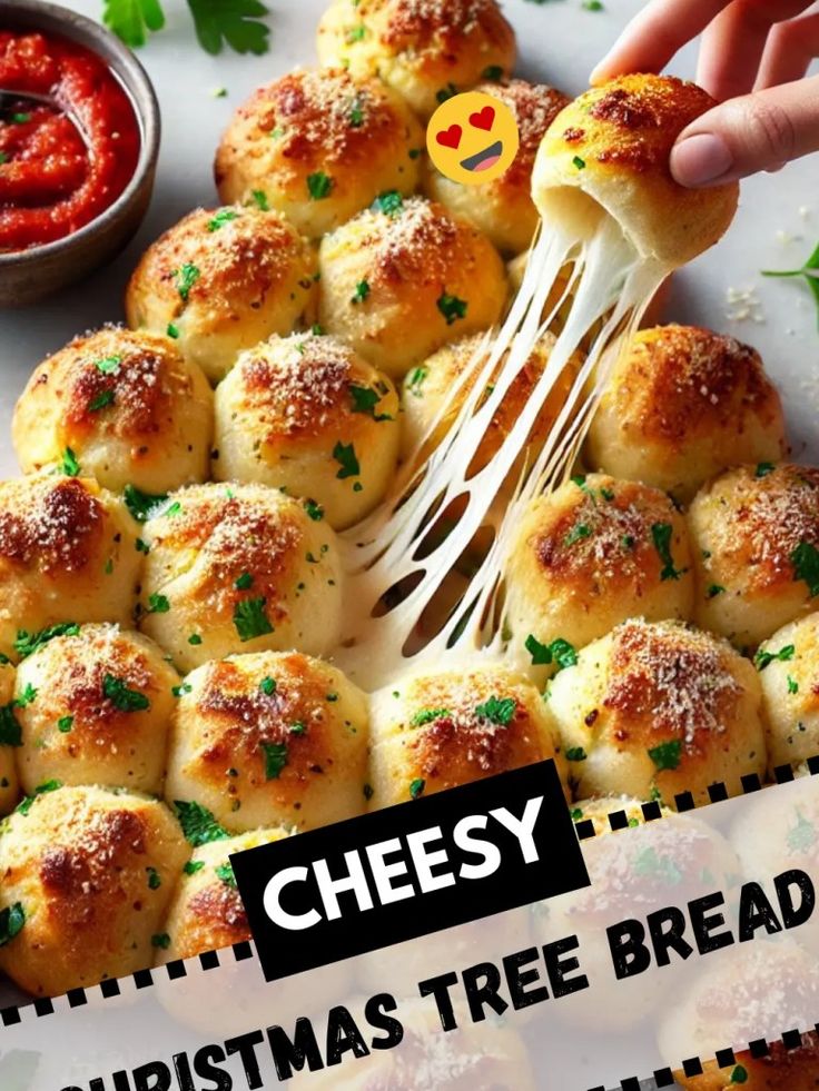 christmas tree bread rolls being held by a spatula with cheese on it and topped with parsley