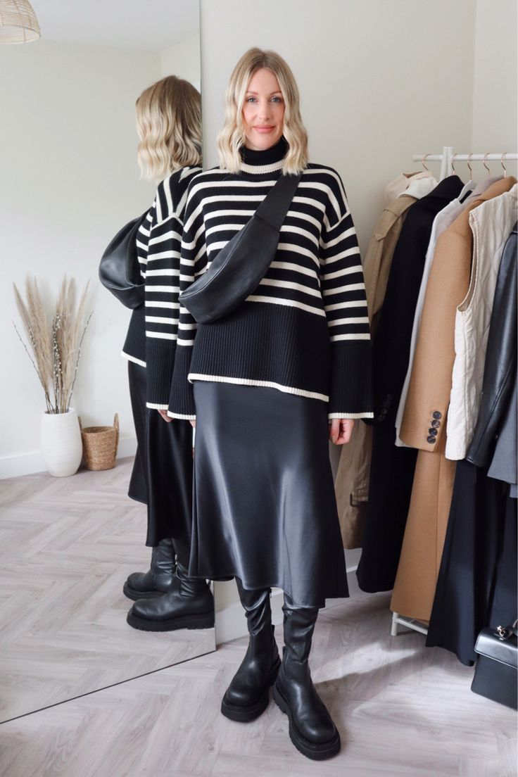 Black Striped Jumper Outfit, Navy Stripe Jumper Outfit, Toteme Striped Sweater, Black And White Striped Jumper, Satin Skirt And Jumper Outfit, Striped Sweater Skirt Outfit, Toteme Striped Sweater Outfit, Stripe Knit Outfit, Striped Knit Sweater Outfit