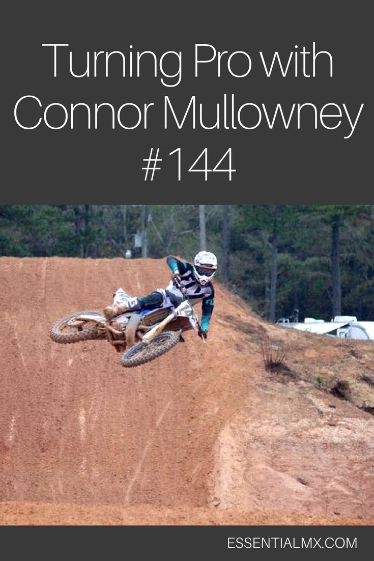 a man riding a dirt bike on top of a dirt hill with the words turning pro with connor mullowhey