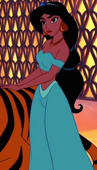 disney princess in blue dress with tiger behind her