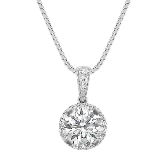 Twenty-one sparkling round diamonds  at approximately .15 carat total weight  serve as the perfect backdrop to the center stone of your choice at approximately .75 carat in this dazzling 14 karat white gold halo pendant.  The design hangs from an 18-inch matching box chain. Please contact a customer service representative for additional information or questions regarding your center stone selection. Antique Amethyst Ring, Lace Wallpaper, Engagement Necklace, Round Diamond Halo, Round Diamond Pendant, Fine Necklace, Necklace Locket, Customer Service Representative, Diamond Pendants