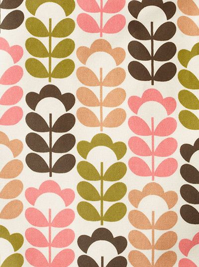 a close up view of a fabric with leaves on the back and pink, green, brown, and white colors