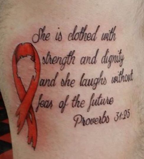 a man with a red ribbon on his chest and the words she is clothed with strength and beauty