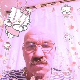 an old man with glasses and a hello kitty shirt is looking at the camera while surrounded by confetti