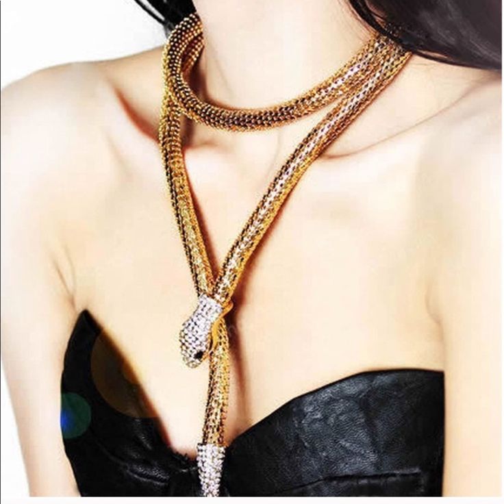 New Gold Crystal Snake Long Pendant Necklace Costume Jewelry Chain For Parties, Party Long Necklace Clavicle Chain, Long Clavicle Chain Necklace For Party, Long Clavicle Necklace For Party, Costume Jewelry Clavicle Chain For Party, Party Costume Jewelry Clavicle Chain, Party Costume Jewelry With Clavicle Chain, Trendy Snake Shape Jewelry With Chain, Trendy Snake Shape Chain Jewelry