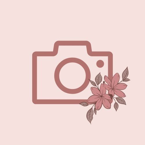 a camera with pink flowers on it