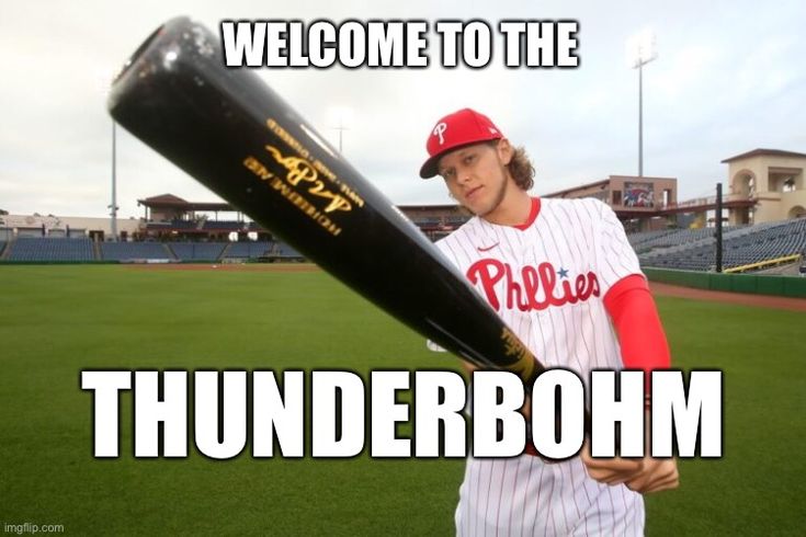 a man holding a baseball bat on top of a field with the caption welcome to the thunderbohm