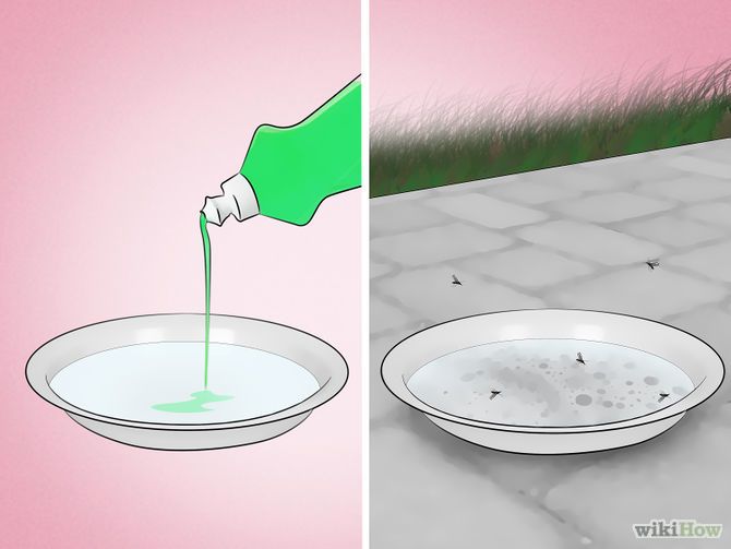 a person pouring green liquid into a bowl on top of a cement floor next to grass