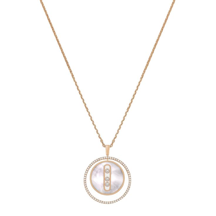 Valérie Messika freed herself from classic, vintage-styled medallion design codes to create a graphic, contemporary diamond jewelry collection. In a unique version, the designer combines her precious pink gold and diamond medallion with white mother-of-pearl, synonymous with purity. One thing is certain: this pink gold diamond necklace with mother-of-pearl will redefine your style, from the most understated to the boldest look. And to make this pink gold diamond necklace and white mother-of-pear Pearl Centerpiece, Diamond Jewel, Mother Of Pearl Necklace, Gold Diamond Necklace, Medallion Design, House Gifts, Pearl Gemstone, Jewelry Creation, Round Brilliant Cut Diamond