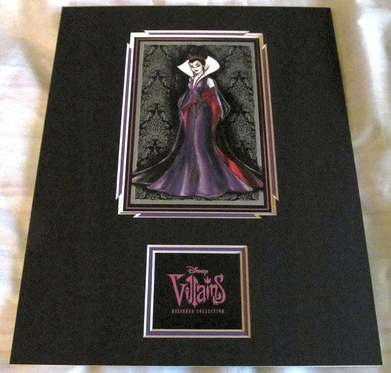 an image of a woman in a purple dress on a black frame with the words,'evil queen '