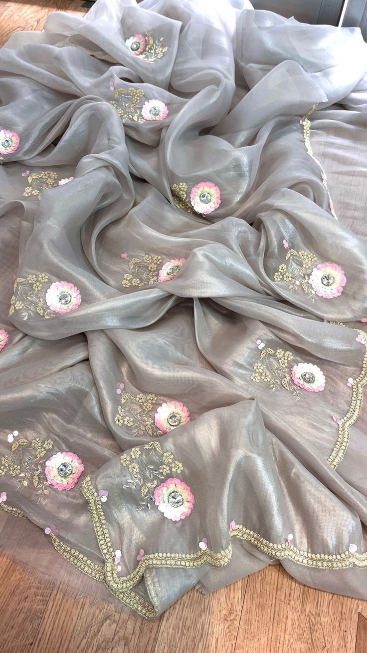 *FABRIC OF SAREE*- 100% pure Soft Tissue silk         *Fabric of blouse* - pure natural crepe               *WORK* - Zardozi, sequins , pearl & zarkan  . Elegant Silk Blouse For Eid, Elegant Silk Blouse With Sheer Dupatta, Elegant Silk Saree With Resham Embroidery, Elegant Tissue Silk Blouse With Dupatta, Georgette Blouse With Pearl Embroidery For Party, Elegant Silk Blouse Piece With Zari Work, Elegant Organza Blouse With Zari Work, Elegant Georgette Blouse Piece With Dupatta, Elegant Silk Blouse Piece For Saree