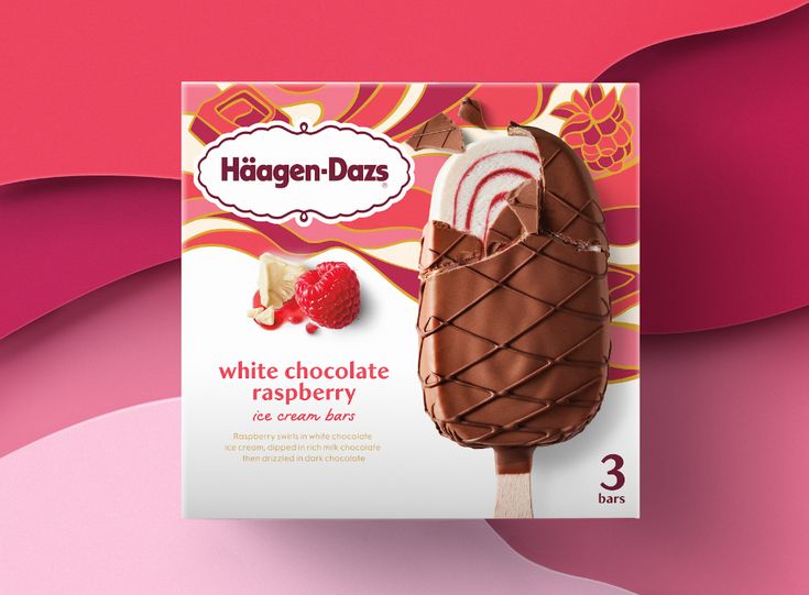 a box of white chocolate raspberry pops on a pink and red swirl background