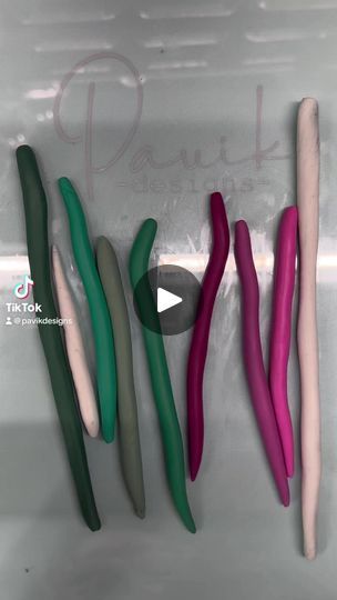 four different colored toothbrushes in a plastic container