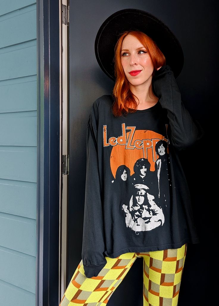 Led Zeppelin II Long Sleeve Graphic Tee by Daydreamer LA. Vintage black colorway with orange and white crackle graphics at front. Ethically made in Los Angeles by Daydreamer LA. Led Zeppelin Ii, Merch Tee, Long Sleeve Graphic Tee, Open Neck, Cool Fits, Tour Shirt, Led Zeppelin, Zeppelin, Band Tees