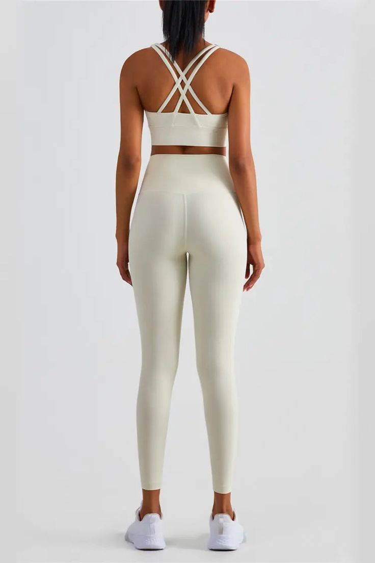 Cream Stretch Activewear For Sports, Cream Stretch Sporty Activewear, Sporty Stretch Cream Activewear, Sporty Cream Stretch Activewear, Fitted Cream Activewear For Yoga, High Stretch Beige Leggings, White Compressive Elastane Leggings, Cream Stretch Yoga Activewear, Fitted Beige Leggings For Gym