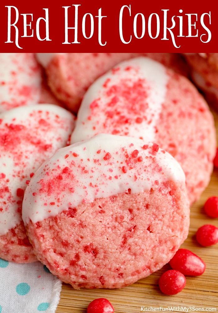 red hot cookies with white frosting and sprinkles