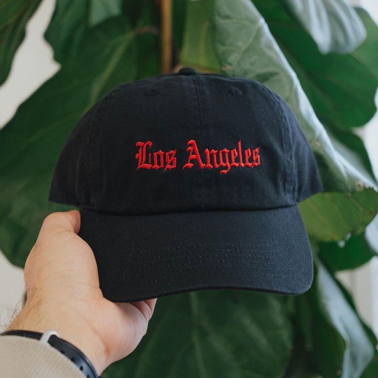 A great gift or piece for everyday wear. Customize by choosing a hat color and embroidery thread color. Direct embroidery, only available here at Embroidered Dad Hats! 🧢 * Embroidered on a cotton dad hat. * Adjusts up to 24" in circumference. * Unstructured and low profile fit. * Free poly-bag shipping in 🇺🇸 (more options at checkout). Embroidered from our shop in Dallas, TX ❤️ If you have any special requests or questions please feel free to message us! Streetwear Hat With Embroidered Logo, Black Embroidered Cotton Trucker Hat, Black Dad Hat With Letter Embroidery For Streetwear, Dad Hat With Letter Embroidery For Streetwear, Cotton Dad Hat With Embroidered Logo, Embroidered Cotton Baseball Cap, Embroidered Cotton Fitted Baseball Cap, Embroidered Cotton Fitted Hat With Curved Bill, Embroidered Cotton Hat With Curved Brim