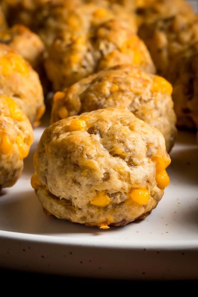 some biscuits are on a white plate and ready to be eaten