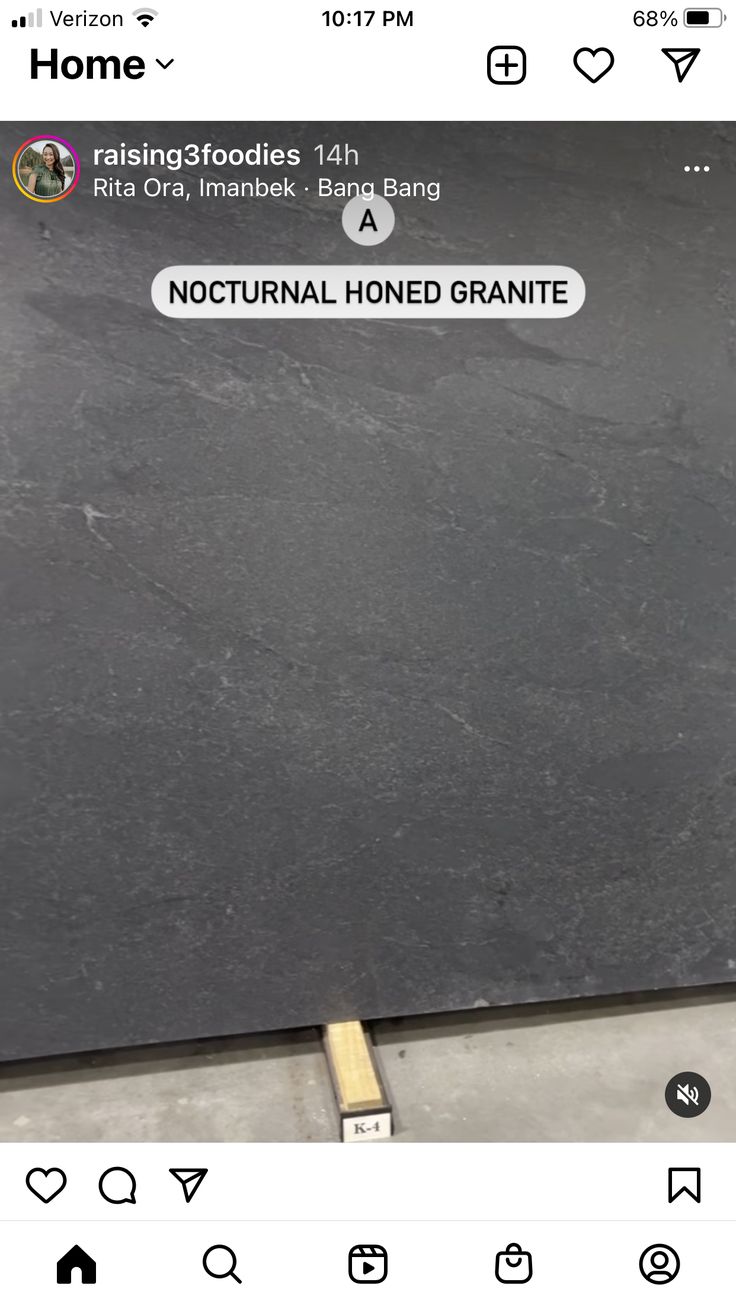 a black granite counter top with an instagramtion sticker on the bottom that reads, nocturnal honed granite