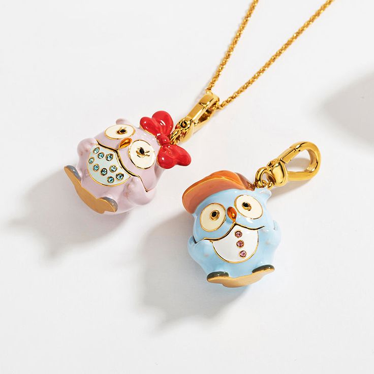 Experience playfulness and elegance with our Adorable Owl Pendant Necklace. Made of gold-plated brass and enamel, this ornate necklace is as delightful as it is timeless with its unforgettable and cute design. A perfect choice for everyday wear, our pendant is the ideal gift for those who appreciate the finer things in life. DETAILS Plating: 18K Gold Materials: 18K Gold on Brass, Enamel Necklace Length: Adjustable, 29.53"(75cm) Weight:18.0g Hypoallergenic design Cute Gold Charms For Gifts, Yellow Gold Enamel Charms For Gift, Playful Gold Charms For Gifts, Whimsical Jewelry With Removable Charms For Gifts, Cute Enamel Necklaces For Gifts, Gold Enamel Charm Necklace For Gift, Cute Gold Enamel Jewelry, Playful Gold Charm Necklace, Whimsical Gold Necklace For Gift