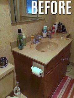 a bathroom with a sink, mirror and toiletries on the counter next to it