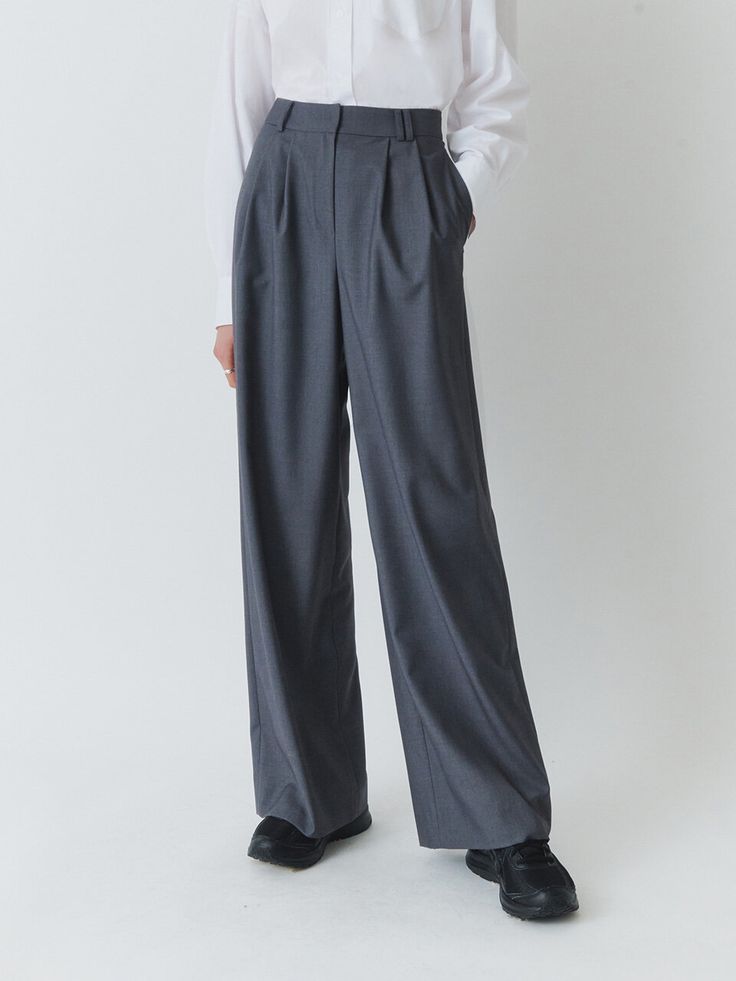 Editor's notesThese are basic high-waisted slacks in a wide leg fit that you will enjoy wearing every day. You can wear these pants with a graphic t-shirt for a fun look or with an oversized shirt for a formal look.- Polyester-blended material pants- Durable TR fabric for a simple silhouette- High-waisted design, beautiful subtle gloss- Two tuck details on the front and belt loopsMeasurements(in.)S / M- Length: 41.34 in. / 41.54 in.- Waist: 13.78 in. / 14.57 in.- Thigh: 13.58 in. / 13.78 in.- Front Rise: 12.99 in. / 13.19 in.- Back Rise: 16.54 in. / 16.93 in.- Circumference: 11.61 in. / 11.81 in.*Measurements may not fully match within 1.18.*Model info: Samy Height 5’9.3” Bust 31.5 Waist 23 Hip 33.5 Fitting Size SComposition & Care- Shell1: 70% Polyester 30% Rayon- Shell2: 100% Po Chic Gray Wide Leg Full Length Pants, Gray Baggy Pants For Workwear, Gray High Waist Baggy Wide Leg Pants, Trendy Gray Wide Leg Pants, Gray Casual Wide Leg Business Casual Pants, Casual Gray Wide Leg Business Pants, Casual Gray Wide Leg Pants For Business, Gray Wide Leg Pants For Office, Gray Wide Leg Office Pants