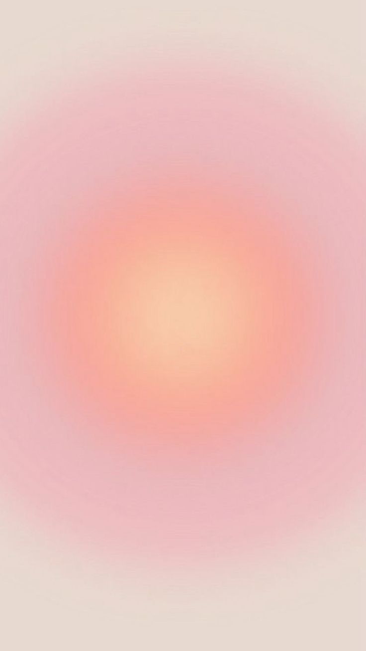 an orange and pink light in the middle of a white background with no image on it