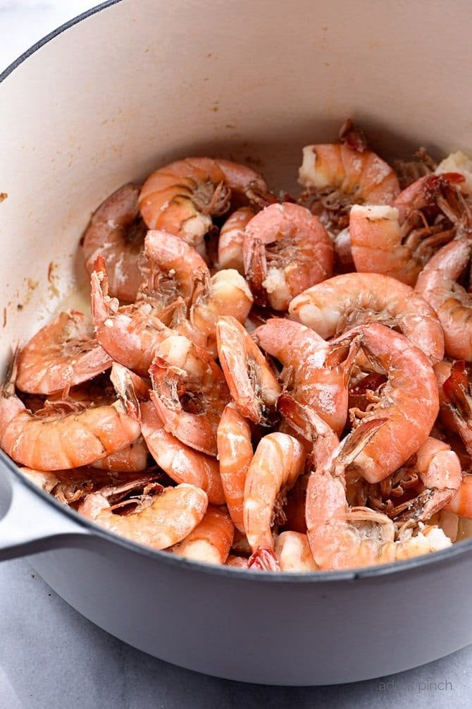 cooked shrimp in a pot on the stove top, ready to be served for dinner