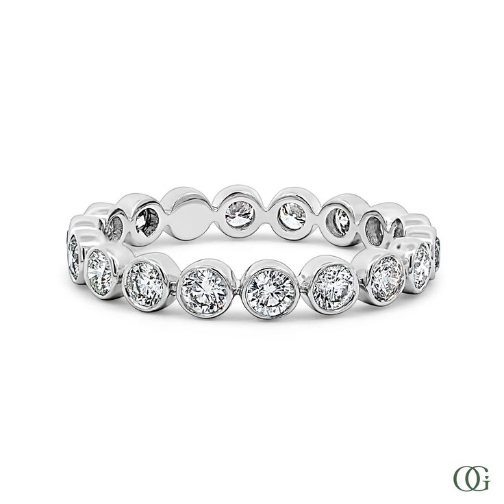 This Round Sparkle Eternity Band has a stunning 0.92 CTW of diamonds, creating a glamorous and timeless look. The round cut diamonds provide maximum sparkle, catching the light from every angle. The eternity band design symbolizes everlasting love, making it the perfect gift for a special occasion. Formal Round Eternity Band Fine Jewelry, Luxury Dazzling Round Eternity Band, Luxury Round Cut Eternity Band Fine Jewelry, Luxury Dazzling Round Cut Eternity Band, Fine Jewelry Diamond Eternity Band, Round Shape, Petite Engagement Ring, Round Cut Diamond, Antique Rings, Eternity Bands