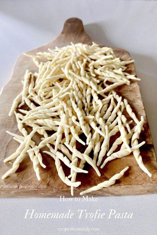 homemade truffle pasta on a wooden cutting board