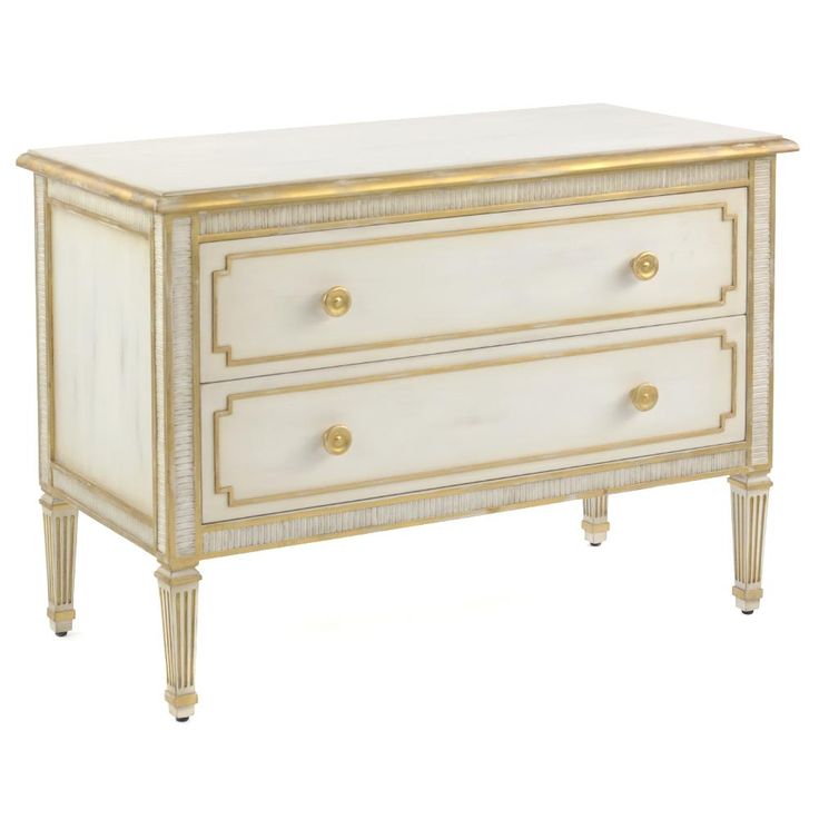 a white and gold dresser with two drawers