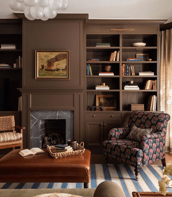 a living room filled with furniture and a fire place