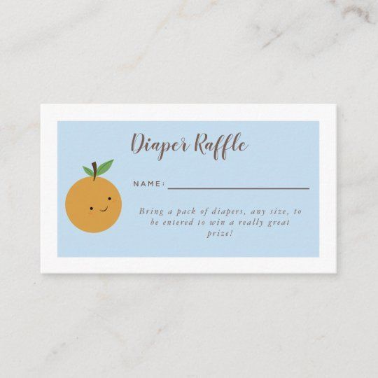 a business card with an orange on the front, and a name tag in the middle