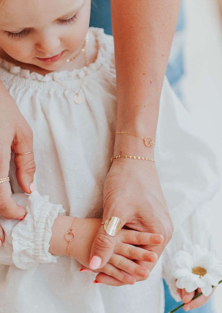 The TINY collection is home to our most dainty + delicate pieces. Tiny links measure 1/2" wide and are attached to our most delicate chain. Bracelet is adjustable from 6.5 - 7". Available in 14kt Gold Fill + Sterling Silver. Handmade in Eau Claire, WI Our jewelry is handmade so each piece will be unique and may vary slightly from what is pictured. Eau Claire Wisconsin, Backdrops Necklace, Zodiac Rings, Hoop Charms, Handmade Jewelry Designs, Delicate Chain, Bracelet Collection, Jewelry Case, Earring Backs