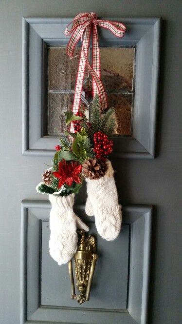 christmas stockings hanging on the front door