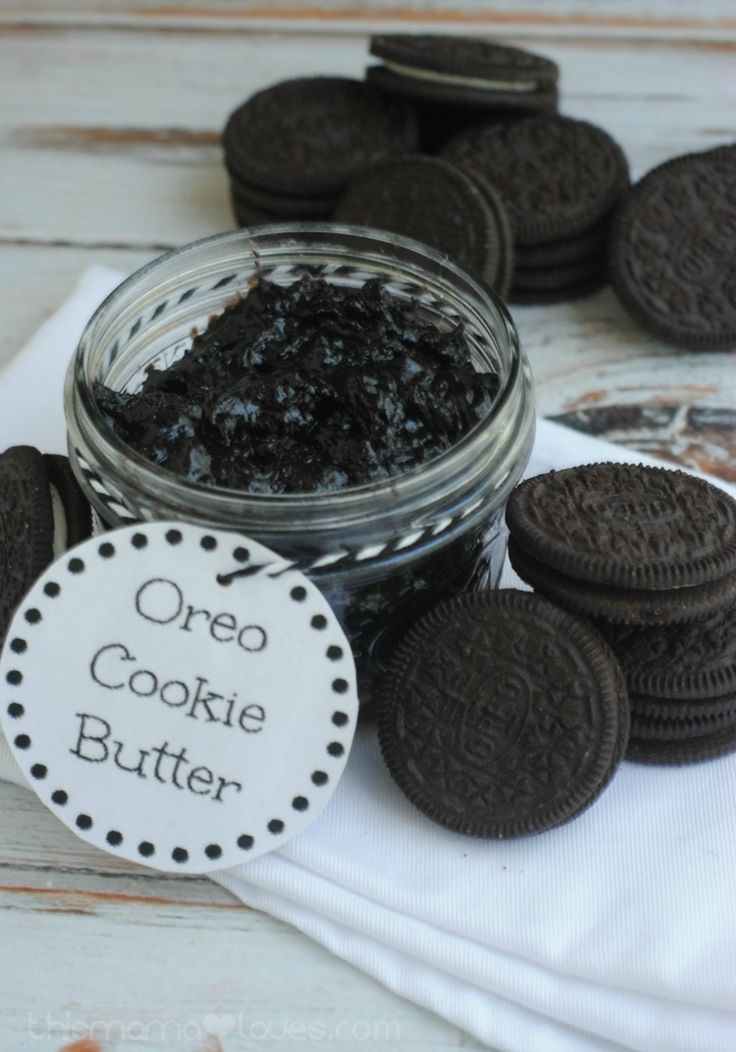 oreo cookie butter in a jar surrounded by cookies