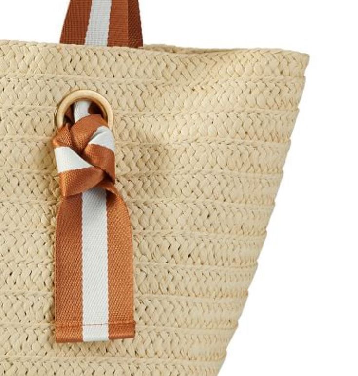 With striped twill handles to add the perfect pop of color, this beautifully woven natural straw tote is the perfect choice for spring and summer days. Match the colorful knotted handles by adding a coordinating embroidered monogram for a personal touch. • Handle drop: 9”• Strap width: 2” Please note: The embroidered monogram shown in the pictures is only for illustrative purposes. Each tote comes without any embroidery. Striped Ribbon, Embroidered Monogram, Straw Tote, Summer Days, Personal Touch, Burlap Bag, Color Pop, Straw, Reusable Tote Bags