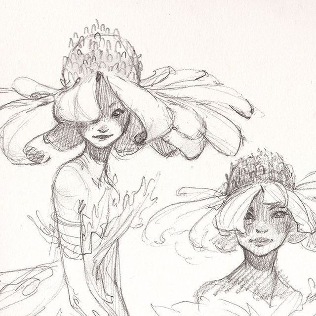 two women with hats in the water, one is wearing a dress and the other has a flower on her head