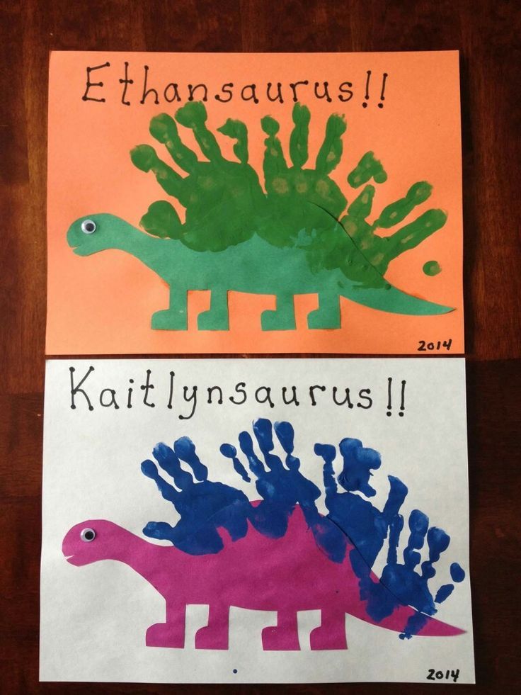 two handprinted dinosaurs on paper with words that read, ` person'ssauruss