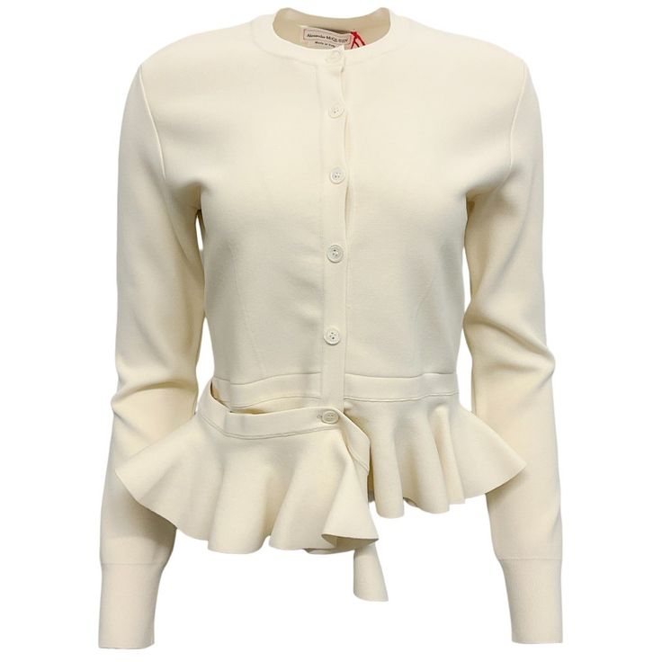 Alexander Mcqueen Ivory Ruffle Cardigan Condition: Never Worn, With Tag Fabric Content: 62% Viscose / 25% Polyamide / 12% Polyester / 1% Elastane Care: Dry Clean Country Of Origin: Italy Color: Ecru Closure / Opening: Button Front Size X Small Bust 16" Waist 13.5" Hip 13.5" Shoulder 13.75" Sleeve 24" Length 20.5" Size Medium Bust 16.25" Waist 13.75" Hip 13.75" Shoulder 14.255" Sleeve 24.25" Length 20.75" Material: Viscose Category: Clothing Subcategory: Knitwear Sub Sub Category: Cardigan ** Pho Fitted Luxury White Cardigan, Luxury Fitted White Cardigan, Fitted Luxury Beige Cardigan, Luxury Fitted Beige Cardigan, Elegant Fitted Cardigan In Winter White, Elegant Fitted Winter White Cardigan, Chic White Formal Cardigan, White Formal Cardigan For Spring, Elegant Cream Cardigan For Formal Occasions