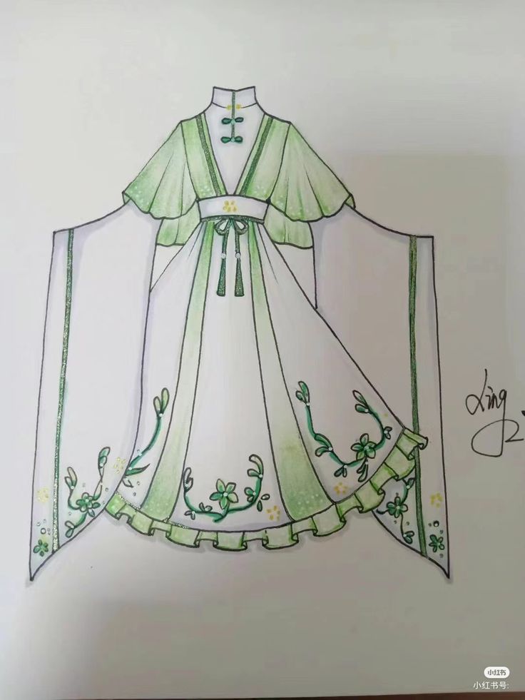 a drawing of a dress with green trims and flowers on it, in front of a white wall