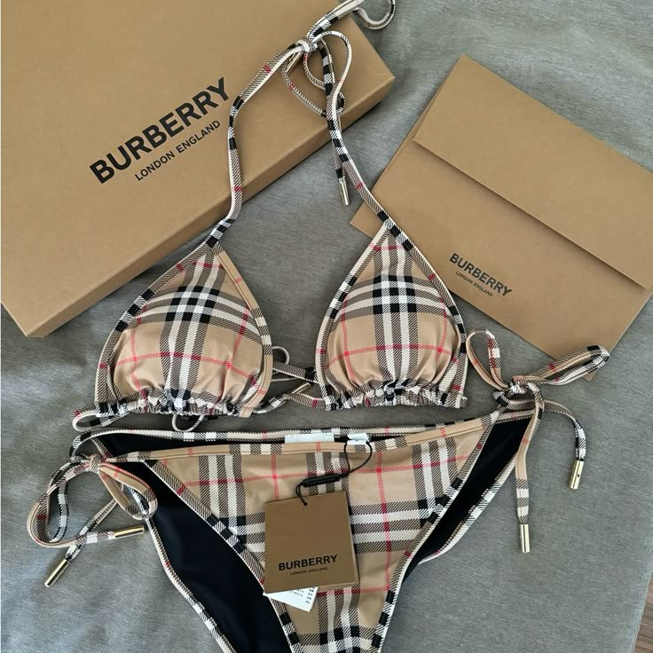 Elevate Your Swimwear Game With This Stunning Burberry Bikini. Crafted With The Finest Materials, This Bikini Is The Perfect Combination Of Luxury And Style. The Beige Color And Iconic Check Pattern Make It A Timeless Piece That You Can Wear Season After Season. The Bikini Is Designed For Women Of All Sizes And Shapes, With A Regular Size Type And A Medium Size. It Features A Classic Bikini Bottom Style That Complements The Overall Look. Perfect For Any Burberry Lover, This Bikini Is A Must-Have Burberry Swim, Designer Swimsuit, Women Of All Sizes, Ouija Board, Swimsuit Design, Swim Suits, Swimsuit Set, Beach Vibes, Really Cute Outfits