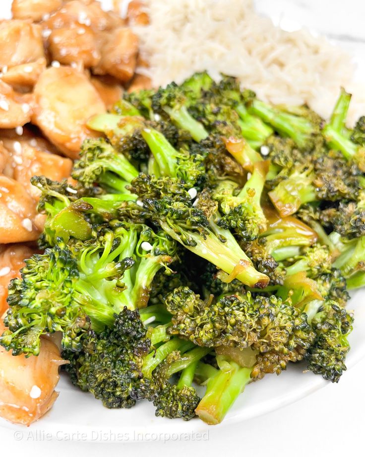 chicken and broccoli on a plate with rice