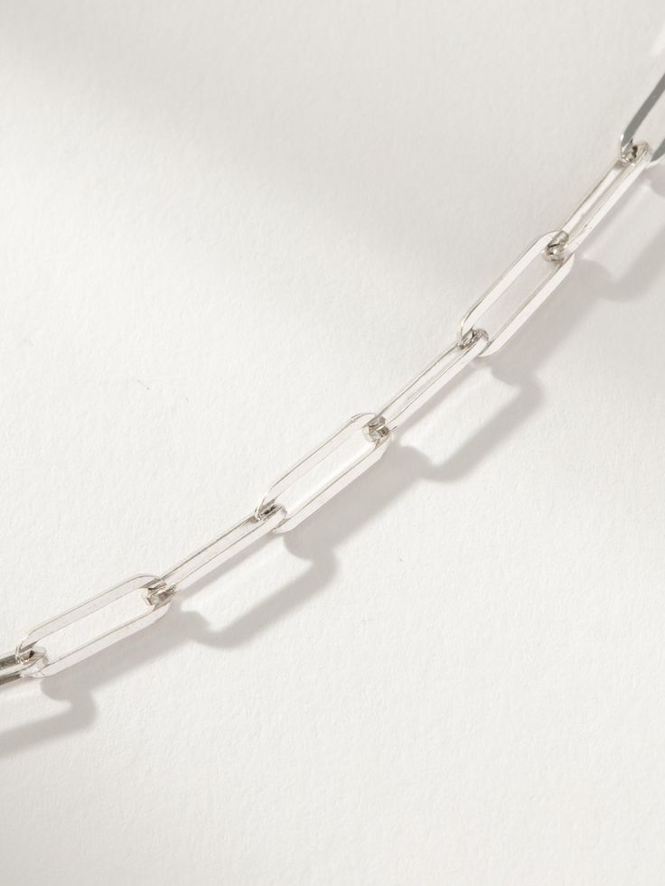 Attention all Sterling Silver lovers, this is your new everyday bracelet. Our Basic Paperclip Chain Bracelet is a staple that goes with all of your simple and statement bracelets, but it can also be worn on its own for a minimal moment. Want the perfect bracelet set to stack with this paperclip chain bracelet? Check out our Mini Gilded Bracelets in Sterling Silver. Silver Paperclip Bracelet With Cable Chain For Everyday, Sterling Silver Paperclip Chain Bracelet For Everyday, Minimalist Metal Bracelet With Paperclip Chain, Sterling Silver Bracelet With Paperclip Chain For Everyday, Minimalist Paperclip Chain Bracelet For Everyday, Everyday Sterling Silver Paperclip Chain Bracelet, Everyday Sterling Silver Paperclip Bracelet, Everyday Silver Paperclip Chain Jewelry, Everyday Minimalist Paperclip Bracelet With Adjustable Chain